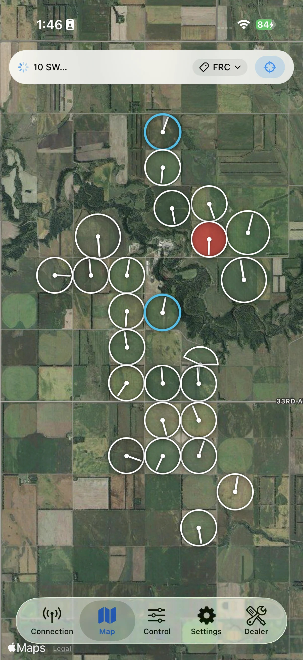 The Map tab showing a working farm with pivots colored by status.